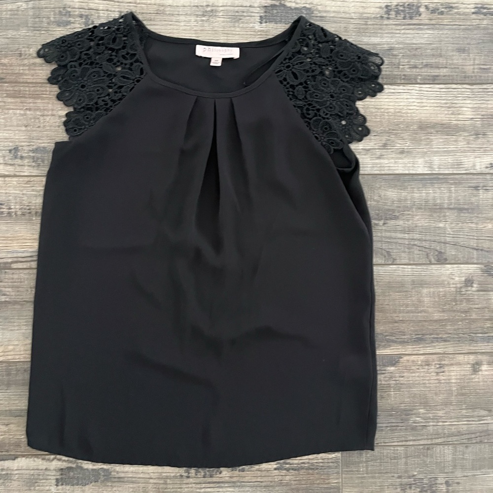 Black blouse. In a fantastic condition worn only twice.